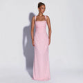Vestido comprido de lantejoulas com racha lateral