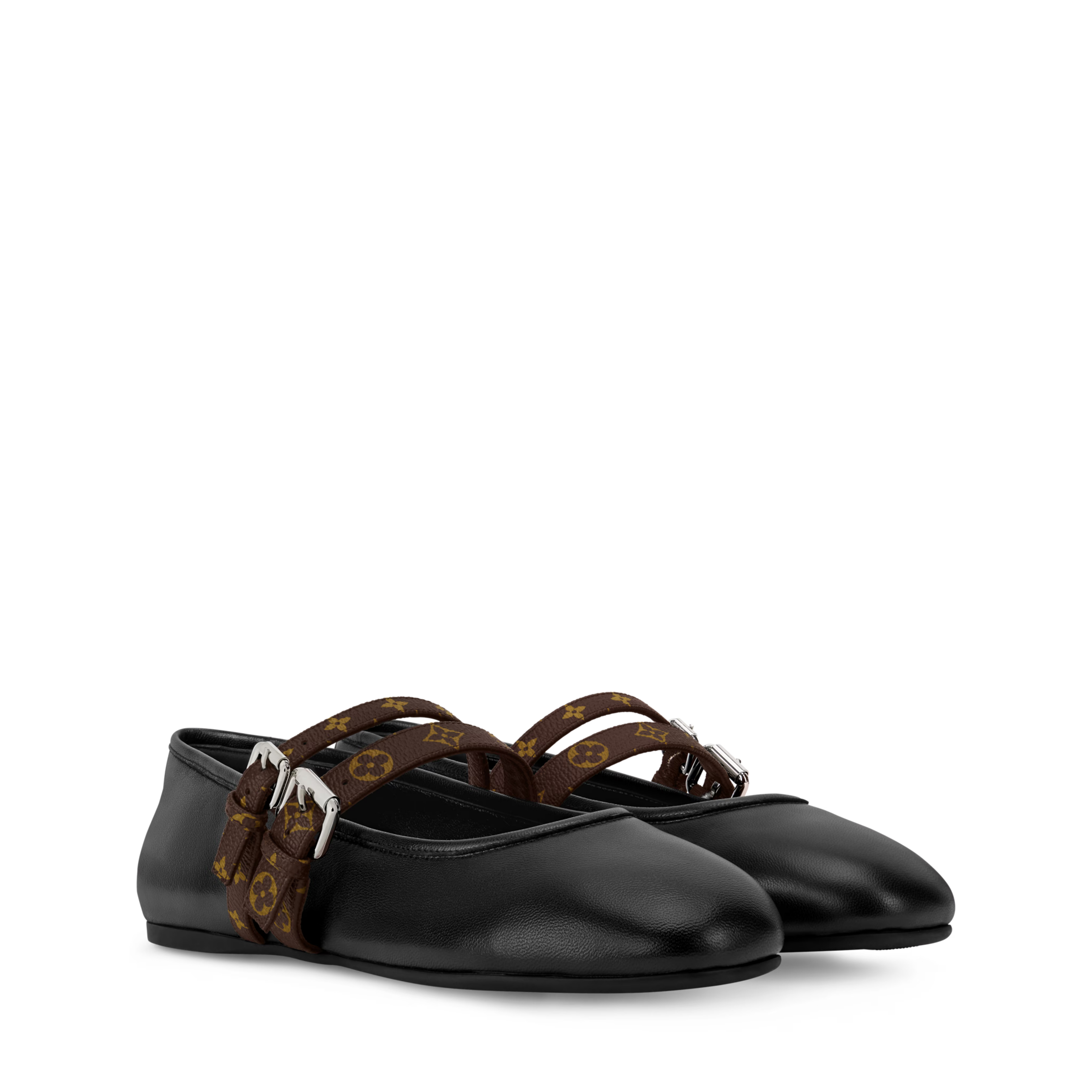Black ballet flats with brown strap on a white background